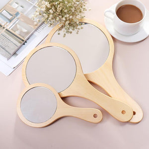 wooden hand mirror