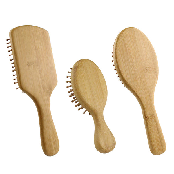 Three bamboo hair brushes